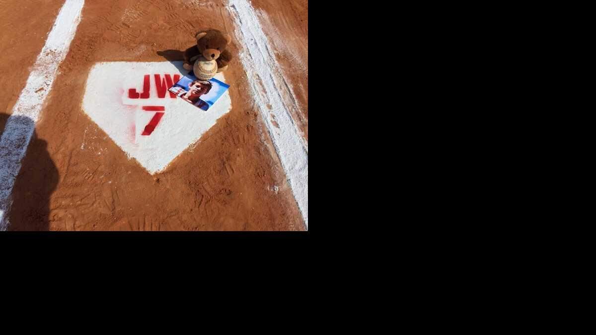 Following news of Jonathan Wells’ death, friends left this tribute at a Key West baseball complex.