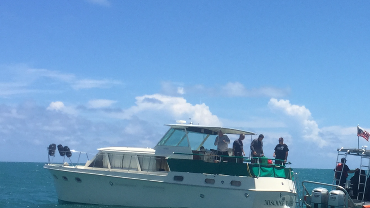 Key West police came to the rescue Wednesday off Smathers Beach when a boater fell unconscious from inhaling engine fumes.
