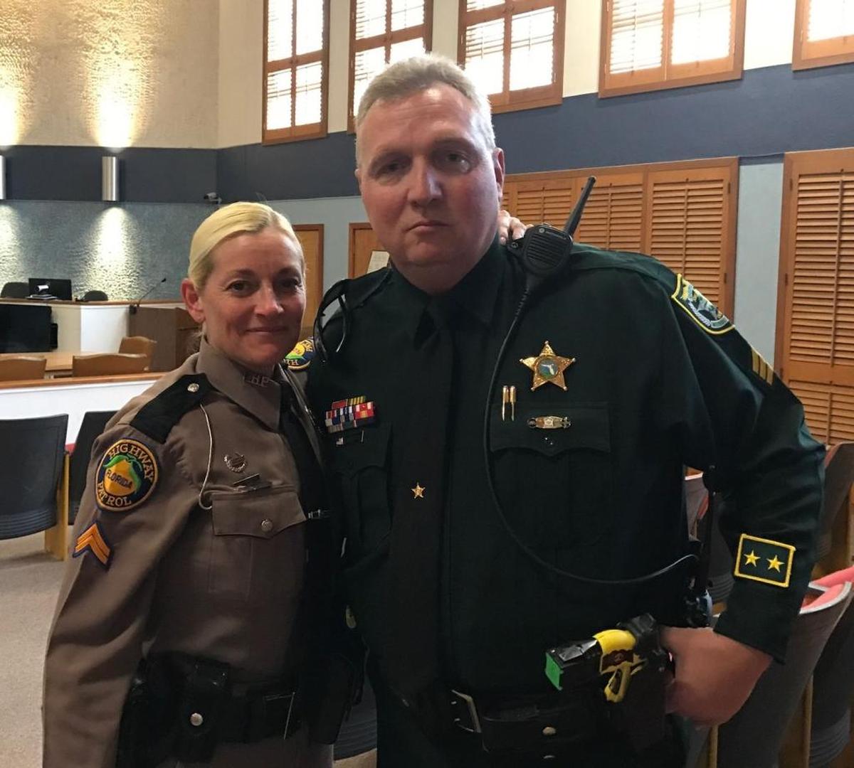 Florida Highway Patrol Cpl. Christine Gracey and Monroe County Sheriff’s Office Sgt. Sydney Whitehouse stand todether in the Plantation Key courthouse after a jury found Robert Schminky guilty of attempted first-degree murder Tuesday, Jan. 21. Both Gracey and Whitehouse were engaged in a rolling gun battle with Schminky, Jan. 21, 2015.