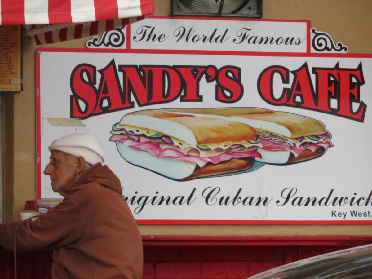 A customer sits at Sandy’s Cafe, 1026 White St., on a recent morning in Key West.