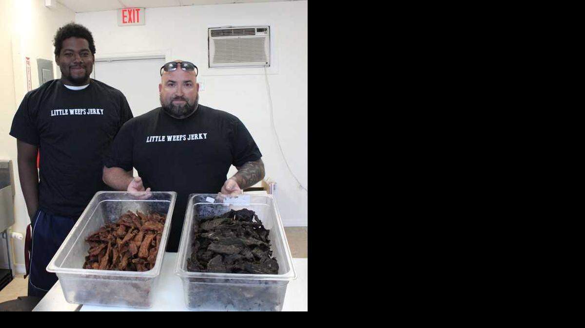 
Kenneth Mantham, left, and Gary Leo stand with a batch of beef and turkey jerky at Little Weeps Jerky, 6799 Overseas Highway oceanside in Marathon.

