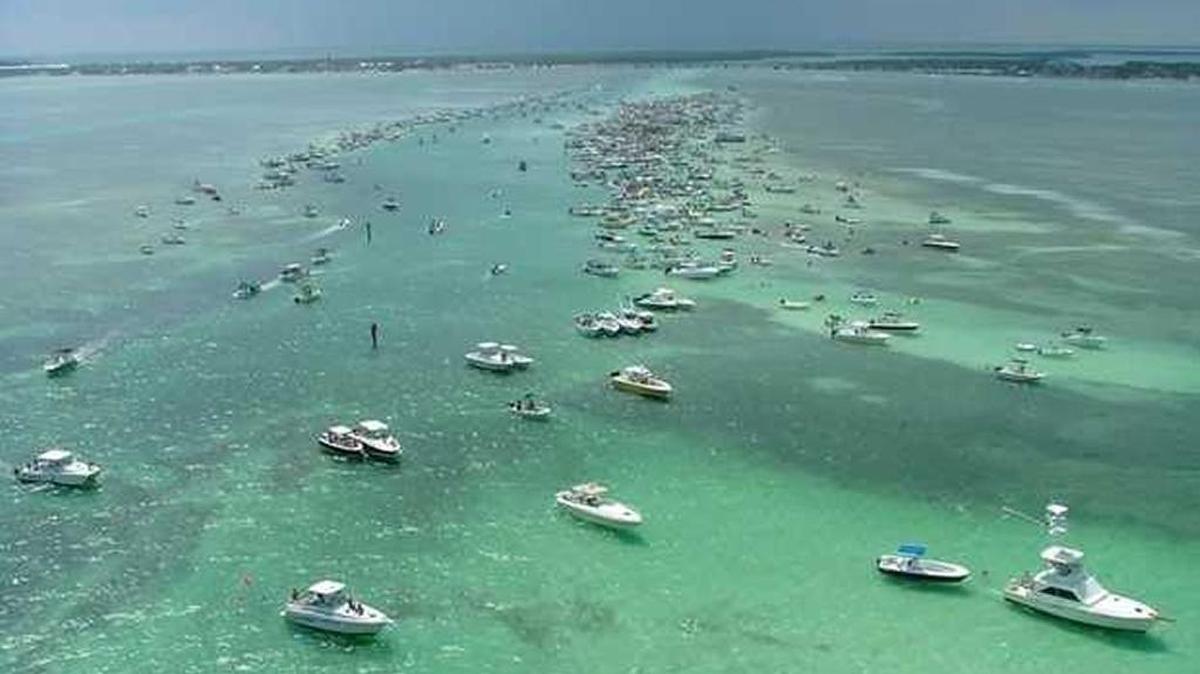 The Sandbar off Islamorada fills with scores of boat during three-day weekends.