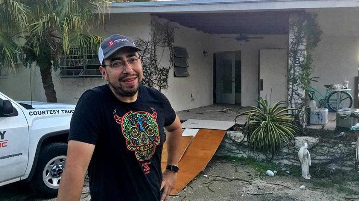 Brandon Bowman outside the house he’s renovating on Man-O-War Drive in Marathon. The former Google employee who now works for the city has quite the Irma story.