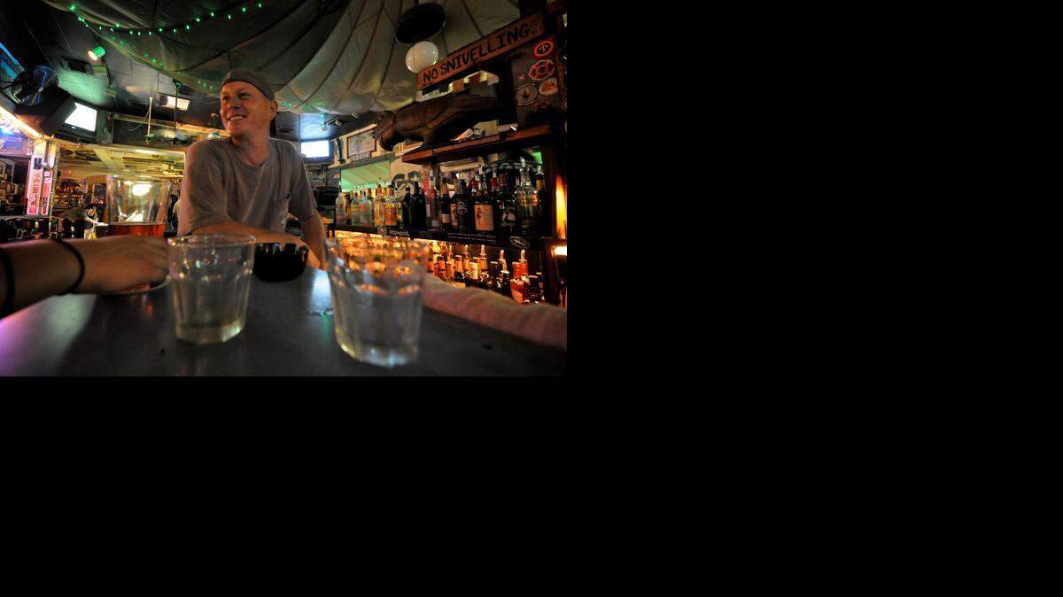 
Andy Ferguson, 39, a bartender, tells stories at the Green Parrot Bar in Key West, Fla., July 30, 2010.
