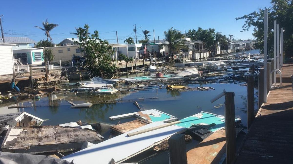 This canal at the Key by the Sea condo complex in Marathon is still full of debris three months post-Hurricane Irma.