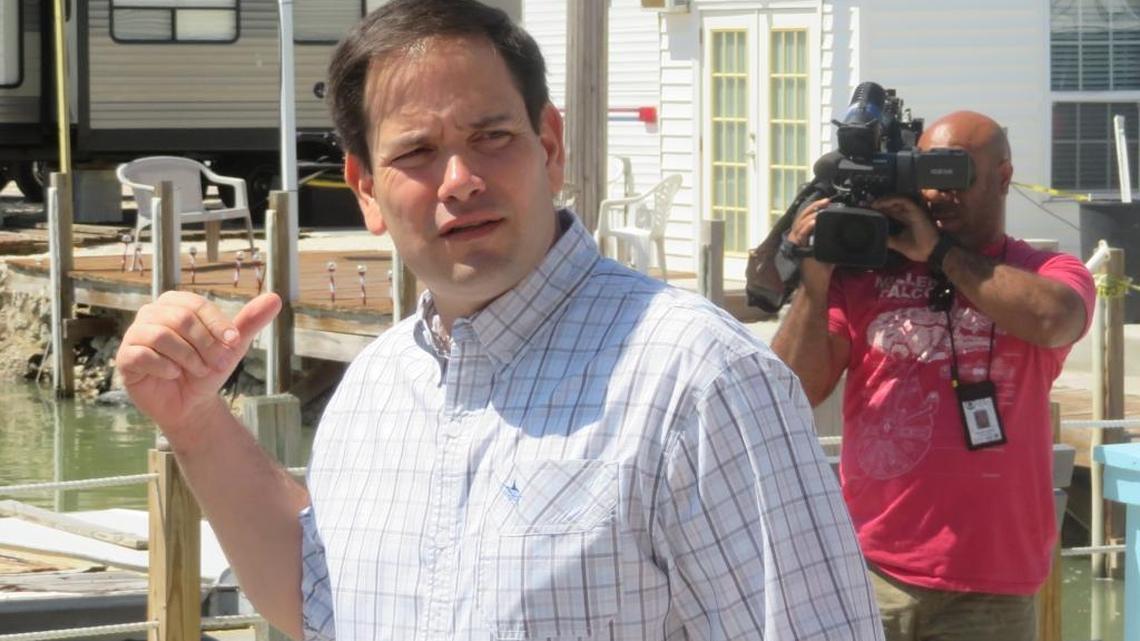 U.S. Sen. Marco Rubio, R-Florida, checks out a debris-choked canal in Marathon on April 4, 2018. Seven months after Hurricane Irma, many Keys residents are struggling with debris and hurricane damage.