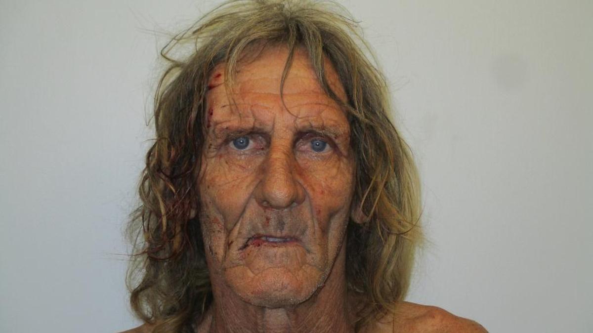 David Banfield’s booking photo after, the Monroe County Sheriff’s Office says, he had to be pulled from his car by several people.
