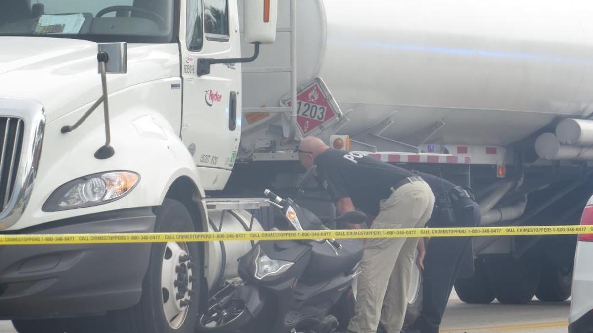 Investigators work a scooter crash Monday afternoon in Key West.