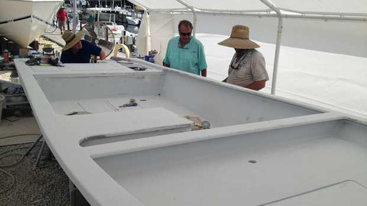 Din Hawley, Jim McLaughlin and Geno Baker discuss the history of the skiff before them that once belonged to baseball great Ted Williams, Hawley and McLaughlinâ€™s father. S&S Performance Marine in Islamorada is completely renovating the vessel.
