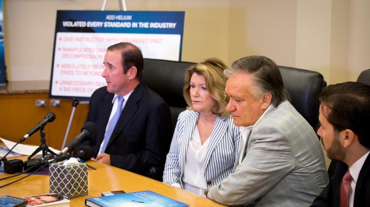 Attorney Michael Haggard sits next to Sandy and Brian Stewart, parents of filmmaker and conservationist Rob Stewart, who died Jan. 31 diving off the Keys. Haggard announced at a March 28 press conference at his Coral Gables office the Stewart family is suing Rob Stewart’s deep dive equipment instructor and a Key Largo dive shop.