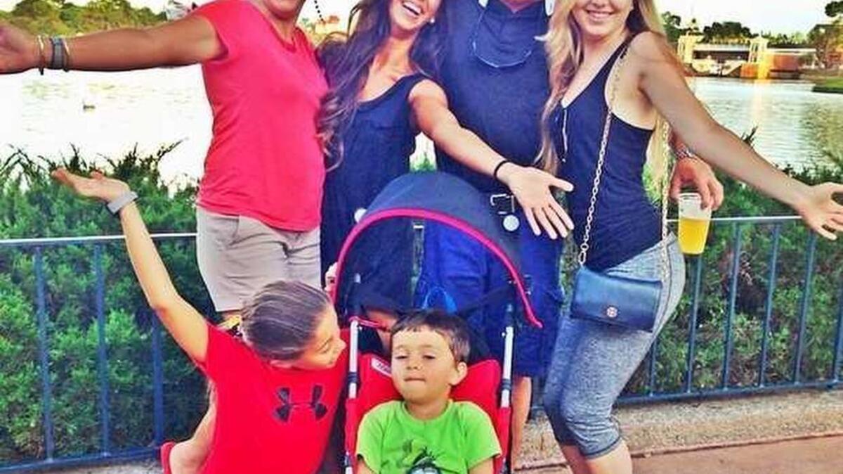 
The Petro family is (front from left) Mercedes Petro and Michael Petro III; and (back from left) Aziza Petro, Lola Petro, Mike Petro and Julianne Petro. Aziza and Michael III remain in Turkmenistan.

