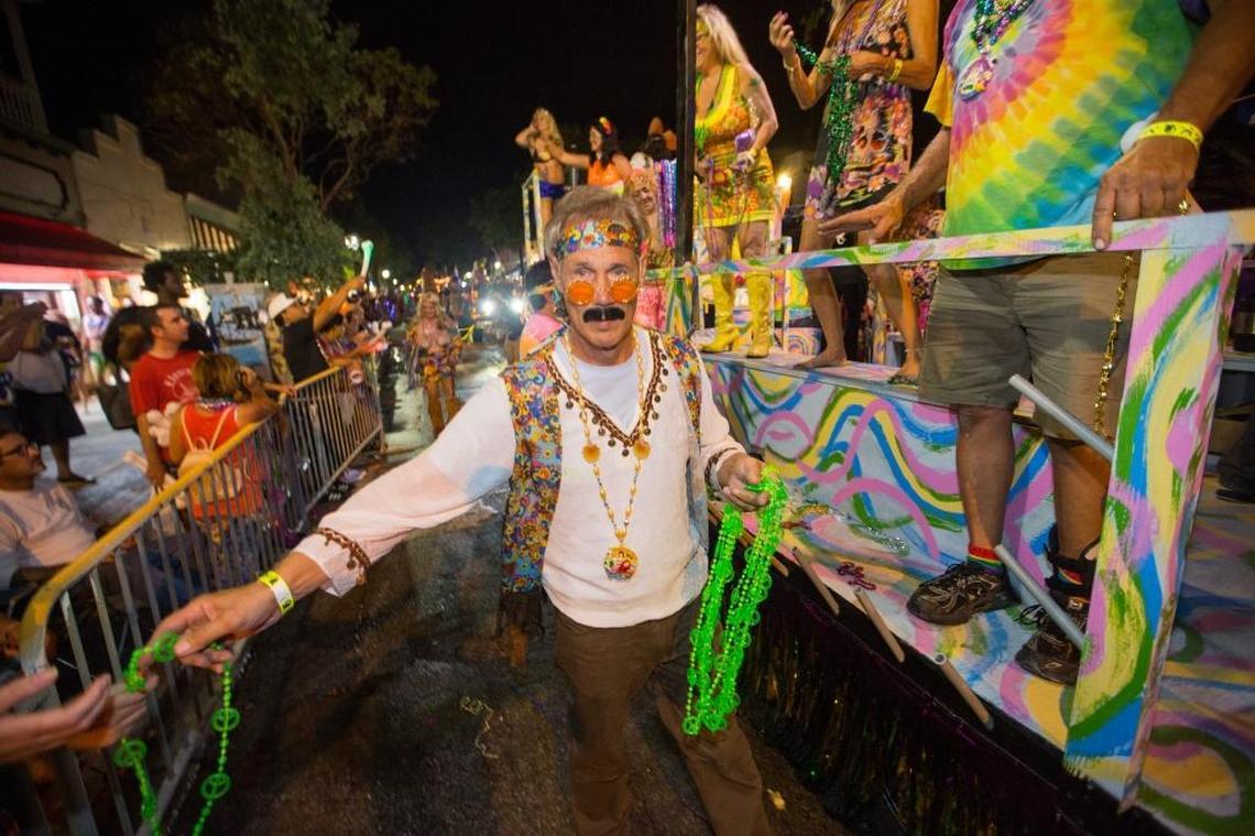 Participants partake in the 2017 Fantasy Fest parade as they make their way down Duval Street in Key West on Saturday, Oct. 28, 2017.