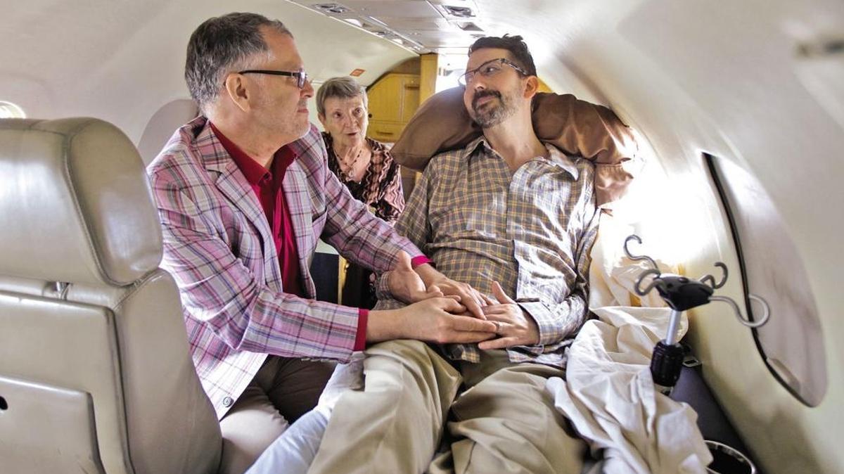 Jim Obergefell marries John Arthur aboard a private medical jet on a tarmac at Baltimore/Washington International Thurgood Marshall Airport on July 11, 2013. John’s aunt, Paulette Roberts, performed the ceremony.