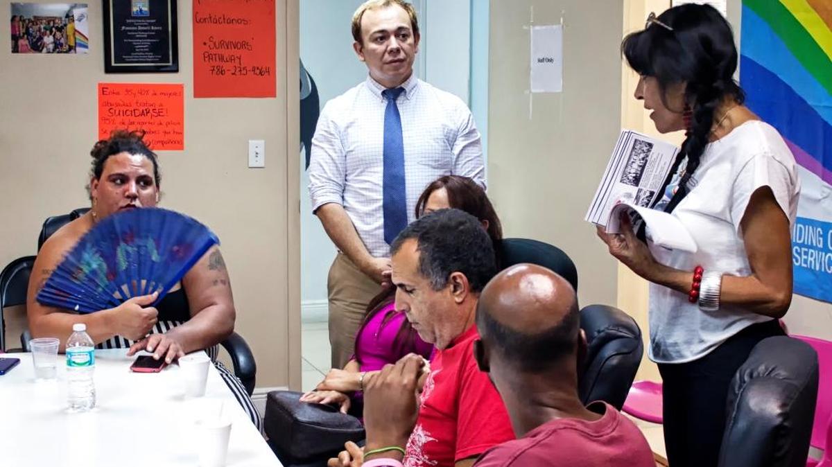
Francesco Duberli leads the organization's group session and discusses help for HIV-positive trans women and where they can get confidential assistance.
