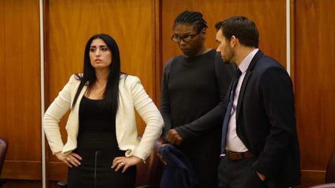 
Harold Seymore in trial last week is flanked by public defender Stacy Marczak, left, and Matthew McElligott.
