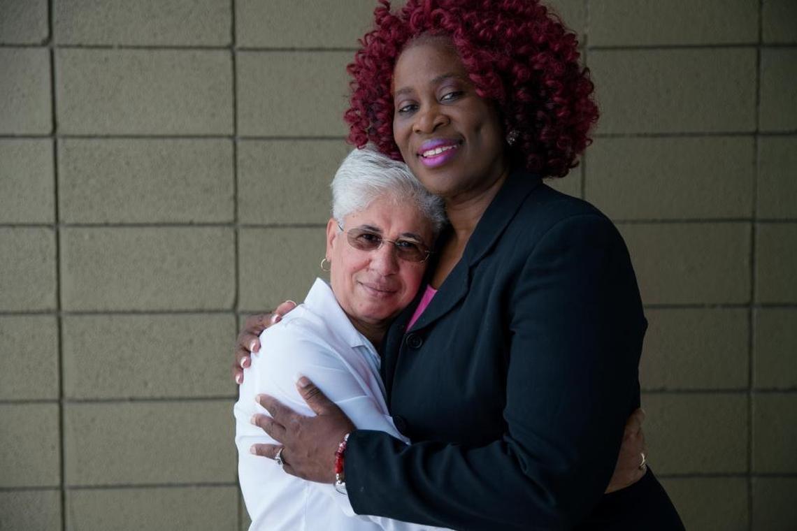 Nancy Rosado, left, embraces the Rev. Debreita Taylor, known as ‘Pastor Brei.’ Both have served as active voices for Pulse victims.