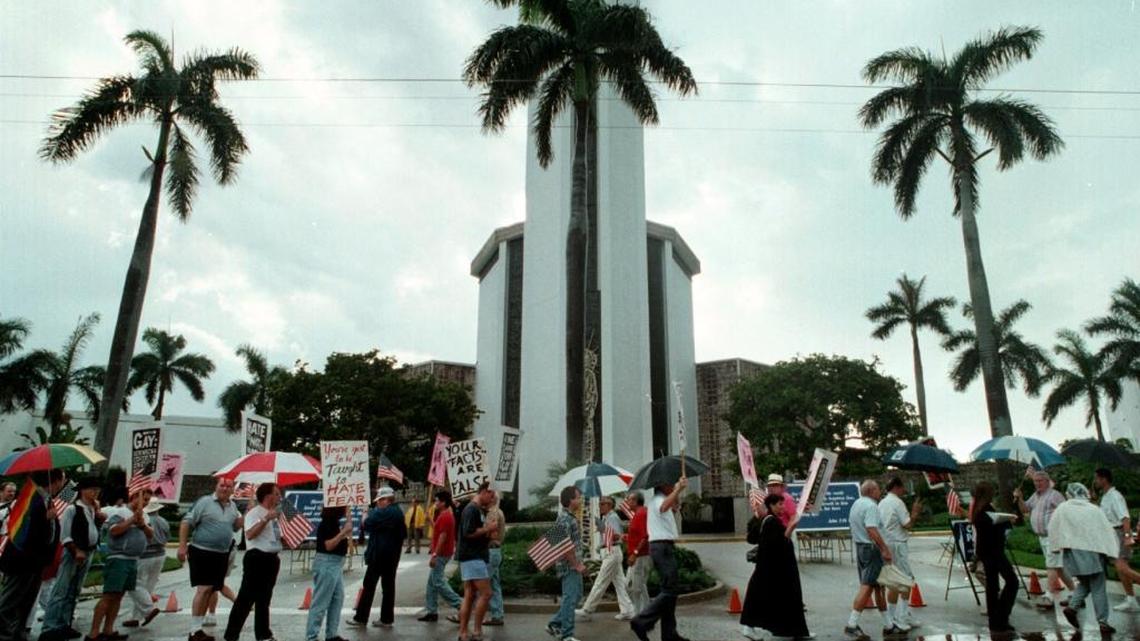 Gay rights protestors march in front of Coral Ridge Presbyterian Church, which is housed in the same complex as the Ministries.