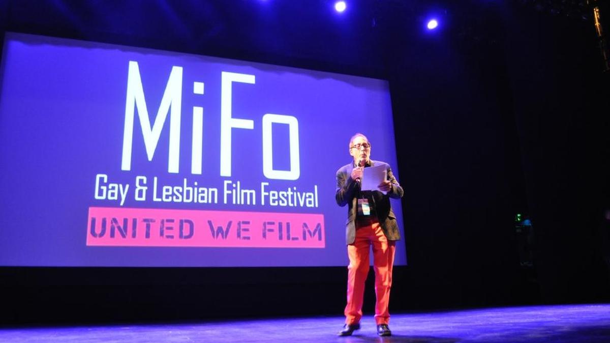 Mark Gilbert welcomes the opening night audience at the 2015 MiFo LGBT Film Festival in Miami. The festival will now be known as the Outshine Film Festival.