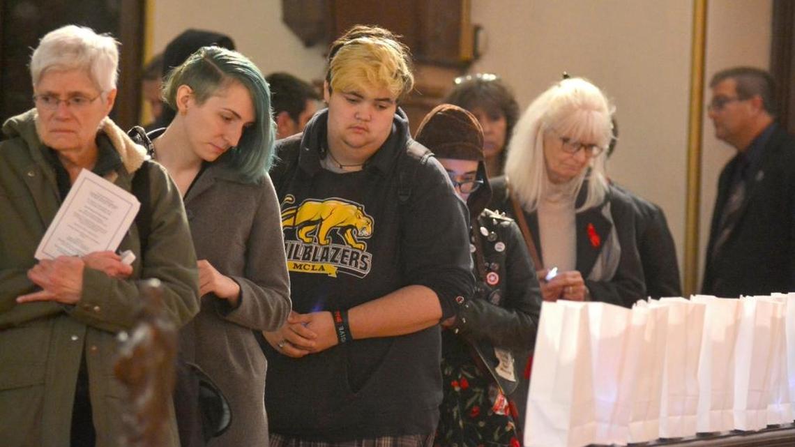 People attend a 2017 Transgender Day of Remembrance vigil at St. Stephen's Episcopal Church in Pittsfield, Massachusetts.