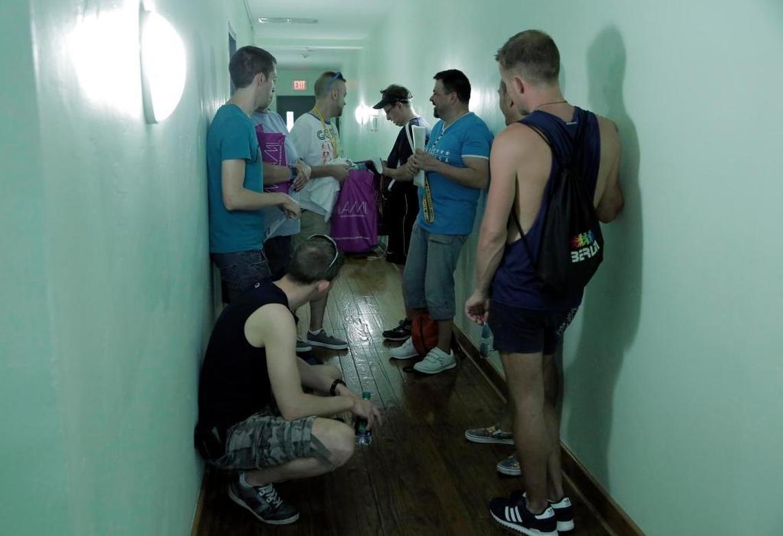 Athletes from Germany wait outside the offices of the World OutGames in Miami Beach looking for answers on Friday, May 26, 2017. Some wanted refunds.