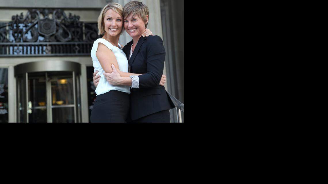 
Melanie, left, and Vanessa Alenier embrace on the steps of the Miami-Dade courthouse after Judge Sarah Zabel lift her stay on same-sex marriage and officiated civil same-sex marriages.



