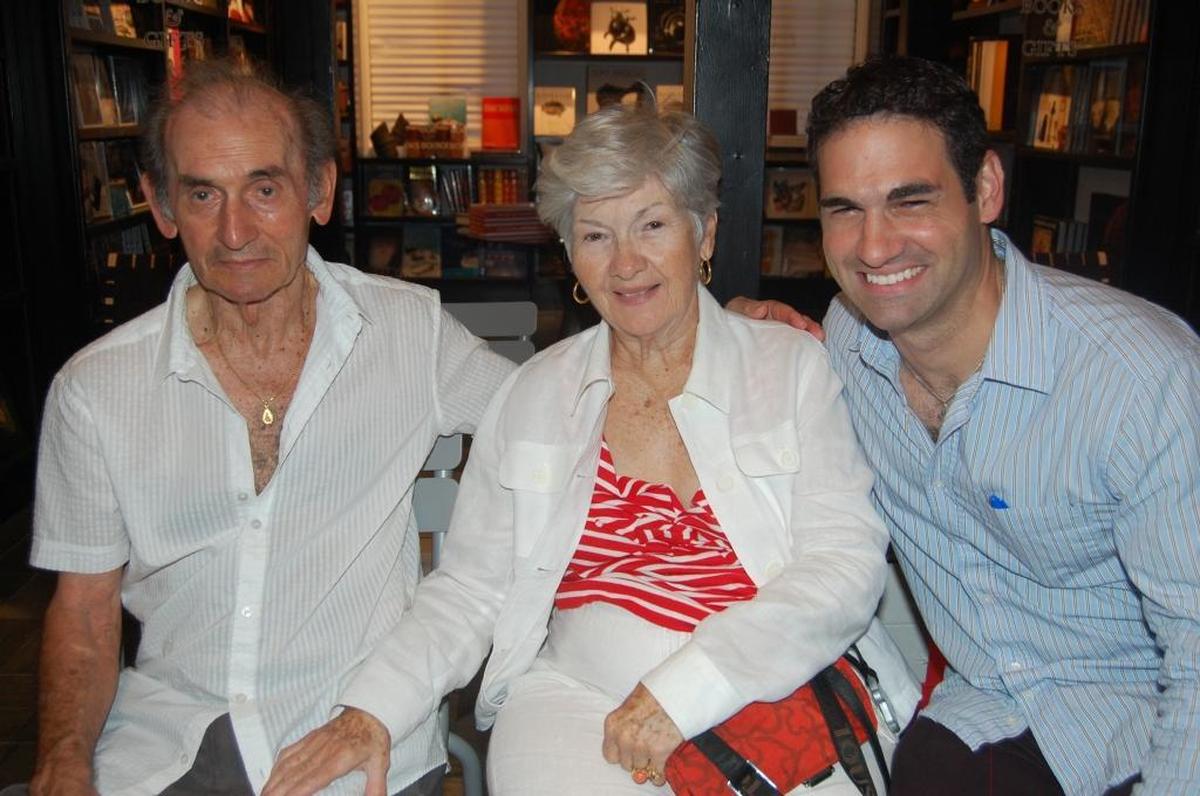 Author Johnny Diaz with his parents, Juan and Mily, in 2009 at a Books & Books Lincoln Road reading for his novel ‘Beantown Cubans.’
