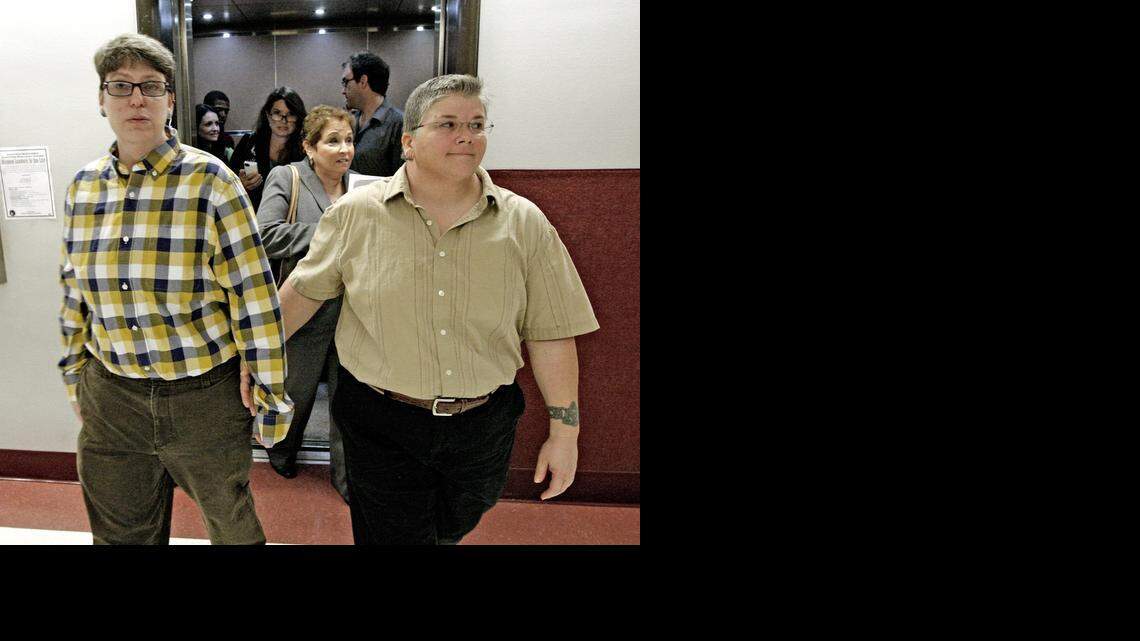 
Heather Brassner and new partner Jennifer Feagin at the Broward County Courthouse after Circuit Judge Dale Cohen initially ruled in August to recognize Brassner's Vermont civil union and grant her a divorce from her estranged former partner. Cohen later vacated his own ruling after learning Florida Attorney General Pam Bondi’s office had not been properly notified of the case.

