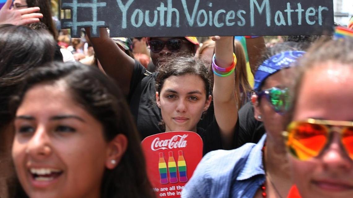 Students march on Ocean Drive at the 2015 Miami Beach Gay Pride parade.