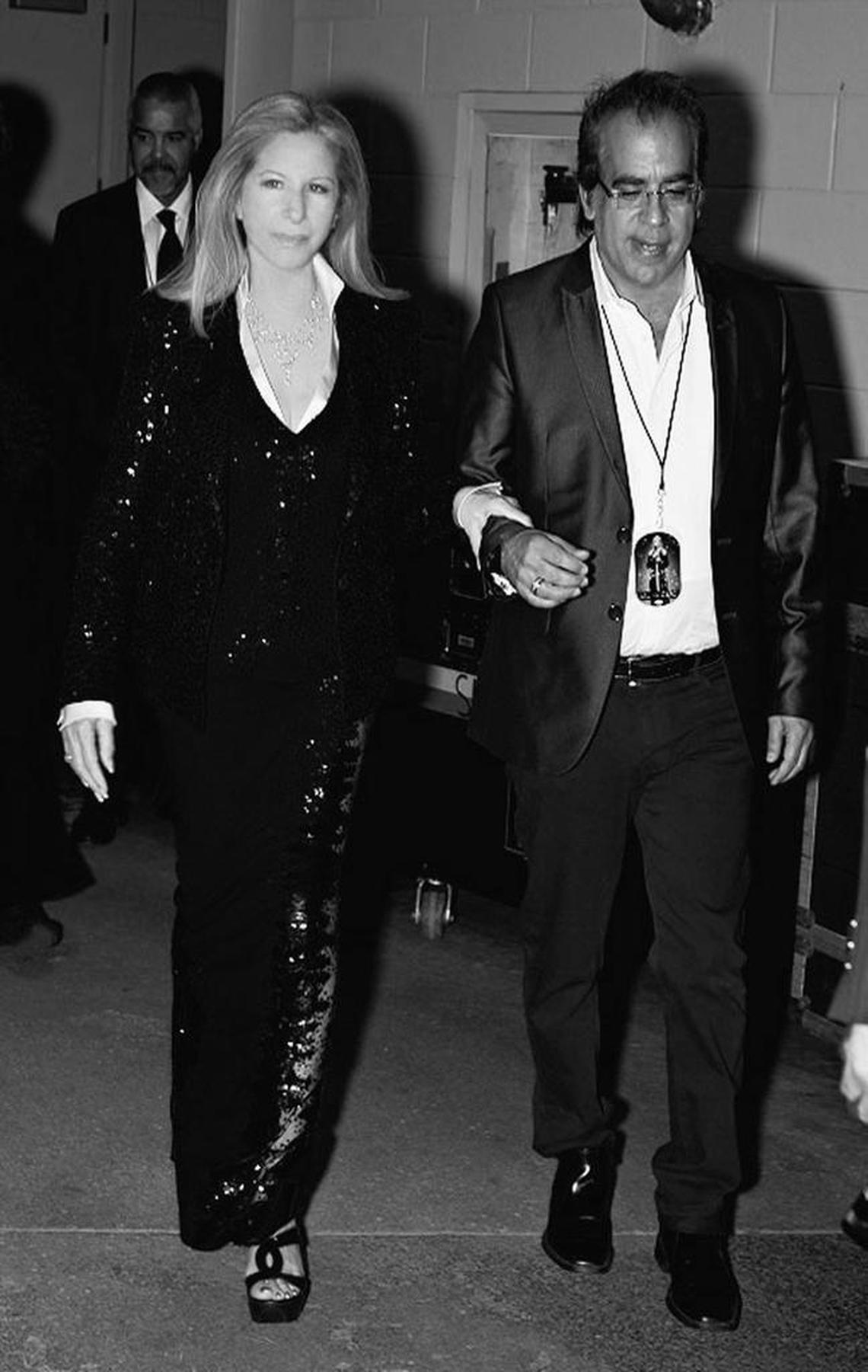 Richard Jay-Alexander escorts Barbra Streisand to the stage just before she performed her 2013 ‘Back to Brooklyn’ concert at Barclays Center in New York.