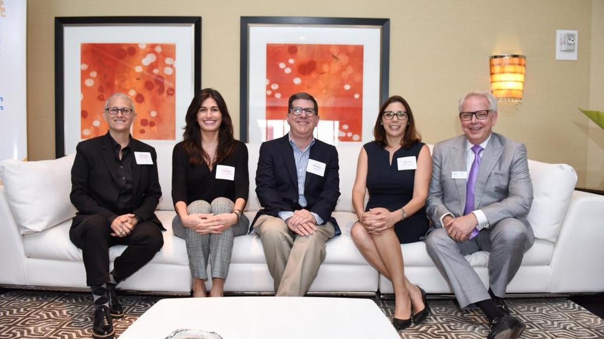 “Navigating the Shifting Real Estate Market”: Panelists Robin Schwartz of Caliber Home Loans, Frances Alban of Alban Communications, moderator Steve Rothaus of the Miami Herald, Cathy Pareto of Cathy Pareto & Associates and Marty Davis of Legal Solutions Group.