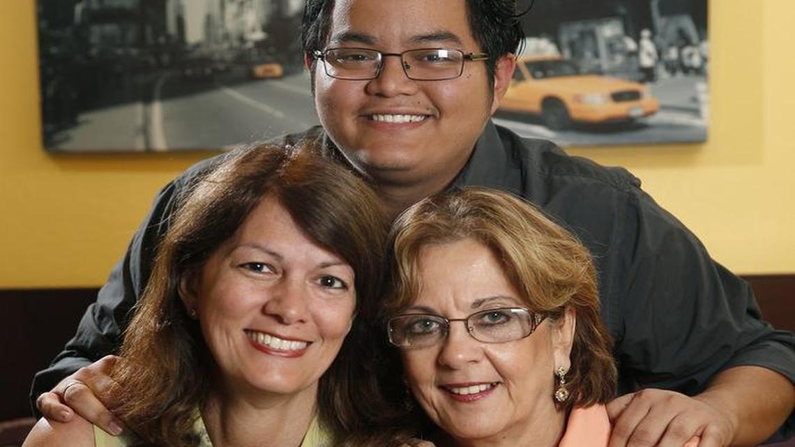 
Jessica Lam, left, a transgender woman, with her son Jesus Jr. and her mother, Yolanda, at Jessica's home in Hialeah on Thursday, April 30, 2015.
