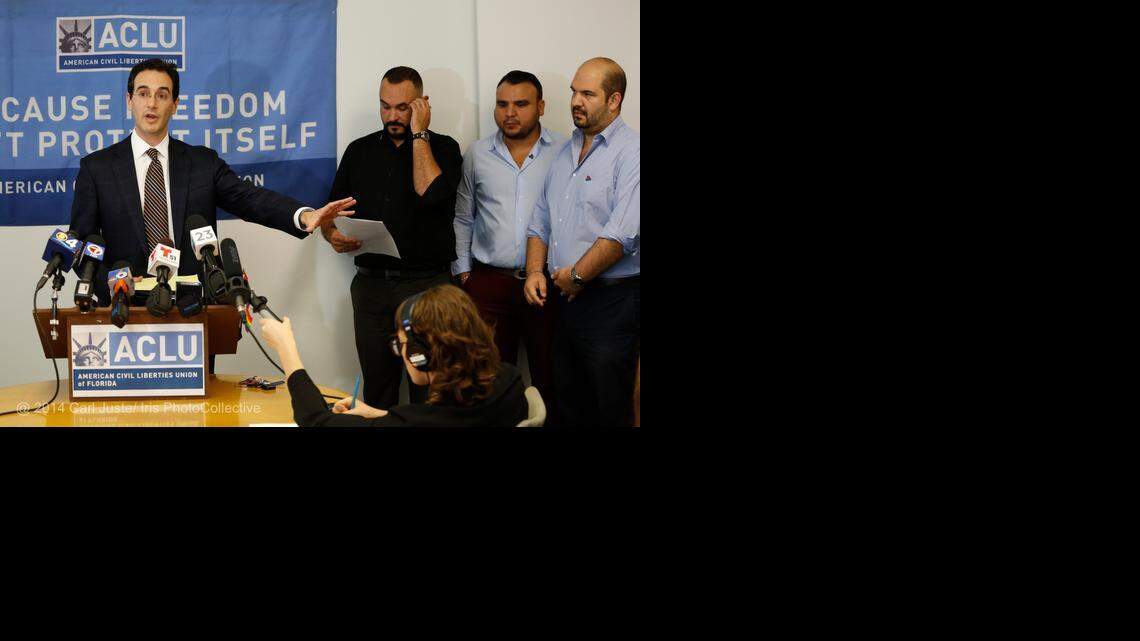 
Attorney Stephen F. Rosenthal, left, SAVE Executive Director Tony Lima and married couple Carlos Andrade and Christian Ulvert at an ACLU/SAVE news conference in August.
