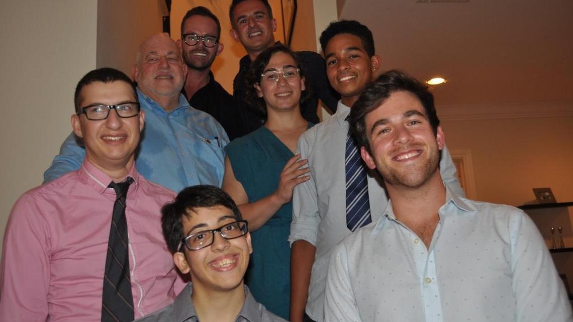 Members of A Wider Bridge and Ma’avarim, an Israeli transgender youth group, visit Fort Lauderdale on Monday, Aug. 15, 2016. Clockwise from left: adult group leader Elisha Alexander; A Wider Bridge Executive Director Arthur Slepian; hosts Aaron Taber and Cantor Mark Goldman; Amy Auerbach, 17; Alan Walker, 19; A Wider Bridge Deputy Director Tyler Harris Gregory; and Adi Ben Barak, 19.