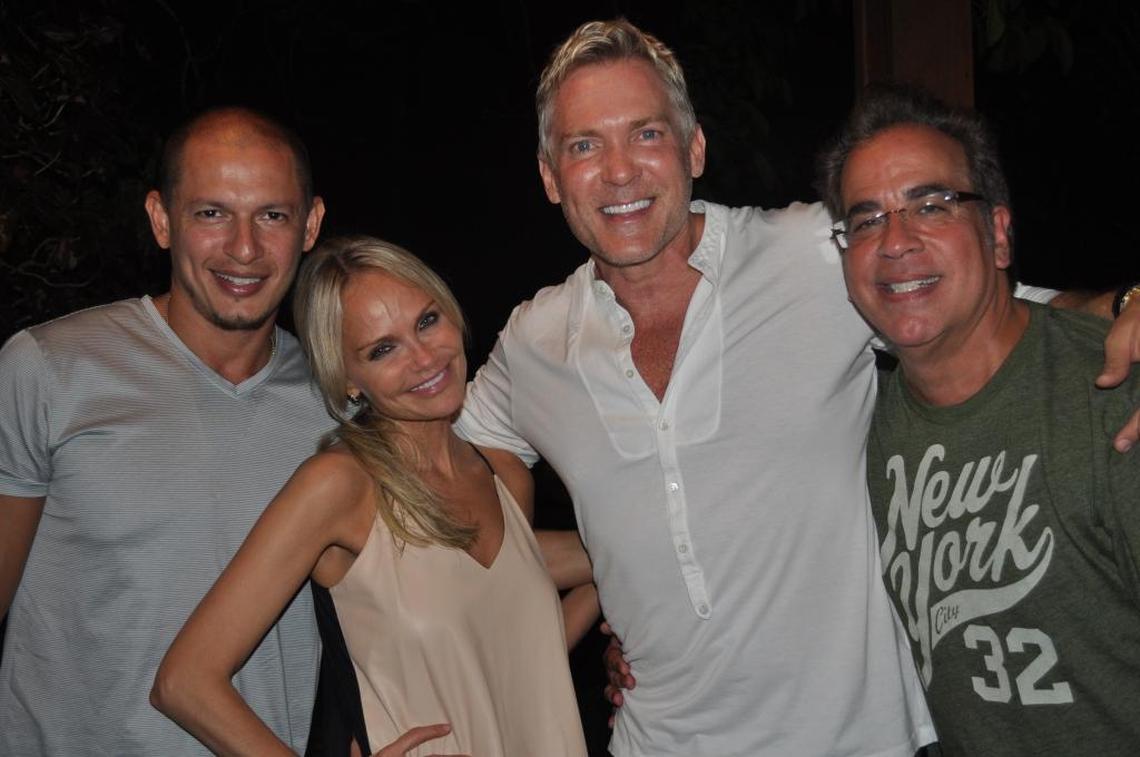 Artist Rubem Robierb, Broadway star Kristin Chenoweth, TV weather anchor Sam Champion and Richard Jay-Alexander at a 2013 party at Jay-Alexander’s Miami Beach home.