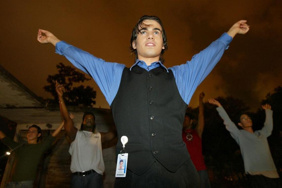 May 2002: Prom chairman Josue ‘Josh’ Santiago, 20, leads in practicing for an upcoming performance during high school prom sponsored by Pridelines, a group for LGBTQ youths.