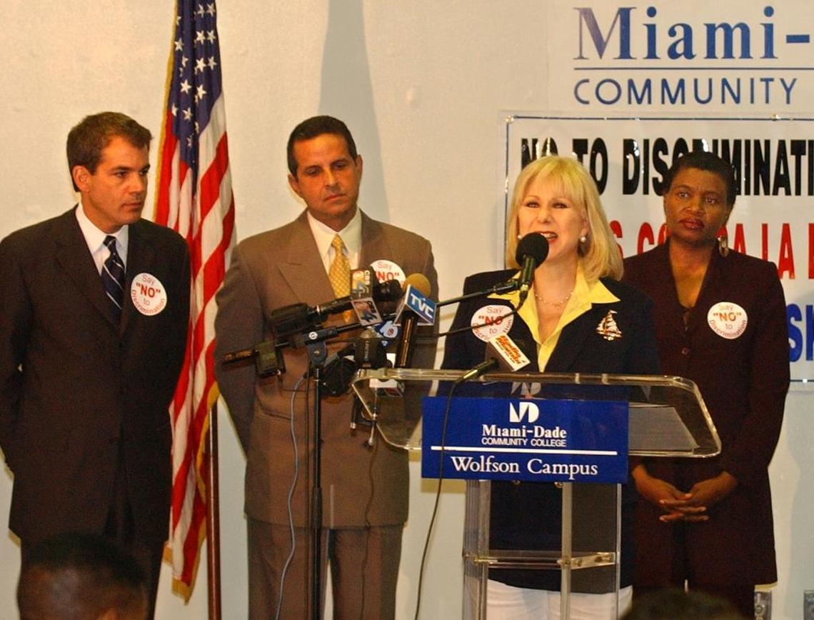 2002: Televison personality Cristina Saralegui speaks at a news conference about a new coalition, ‘No to Discrimination,’ launching a campaign against the referendum to repeal the county's 1998 gay rights law. Others from left: Miami-Dade County Mayor Alex Penelas, Miami Mayor Manny Diaz and Miami activist Marleine Bastien. The law narrowly survived a public vote.