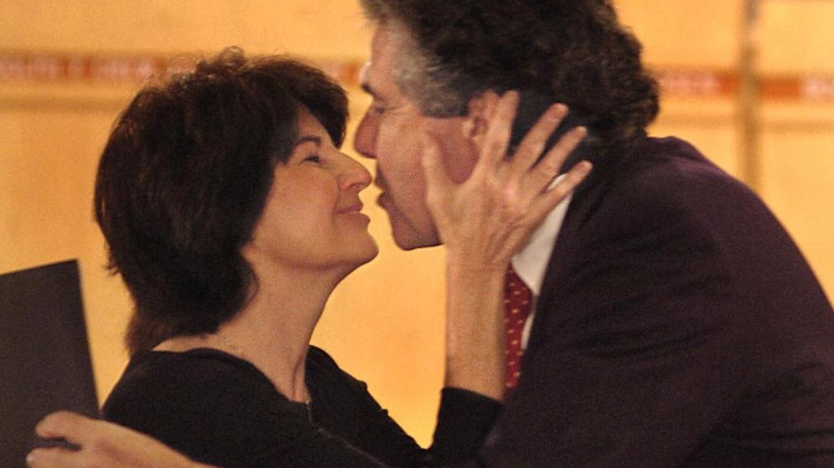Evelyn Greer gives her husband Bruce a kiss after he swore her in as a new school board member in 2006.