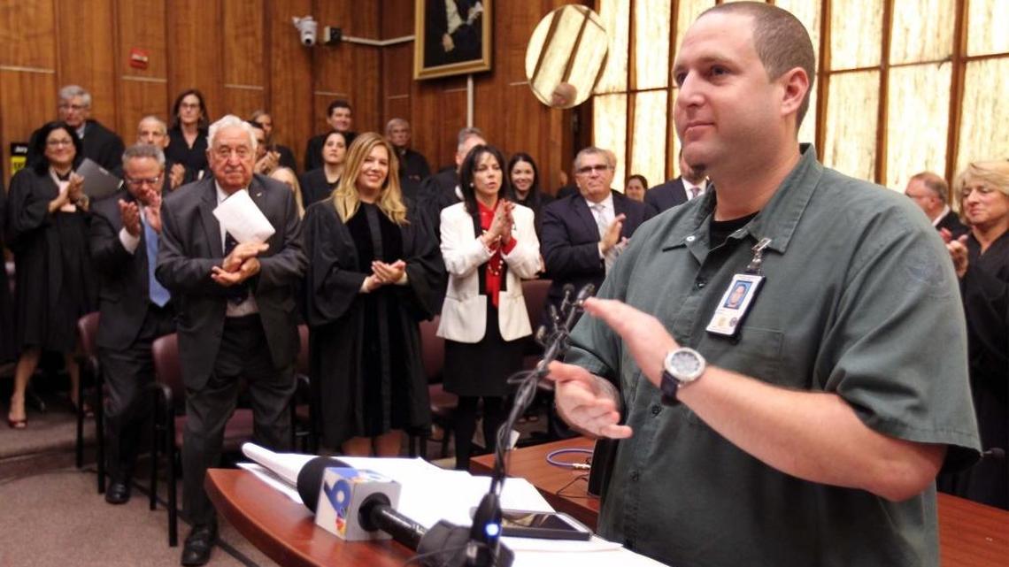 Michael Schmeke of the U.S. Army and members of the Eleventh Judicial Circuit Court of Florida attend a ceremony officially marking the creation of a Miami-Dade veterans court on Friday, January 13, 2017.