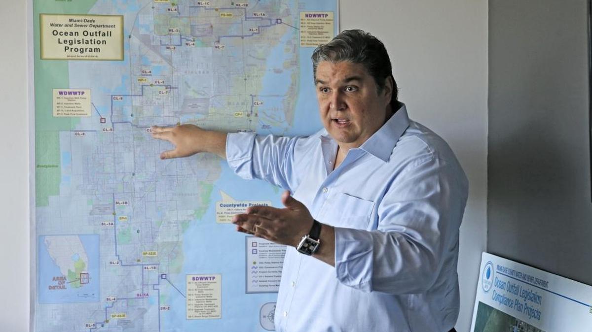 Rafael A. Garcia-Toledo, president of G-T Construction Group Inc. points to a map of county sewer projects his firm is helping manage. While working on this county contract and pursuing others, Garcia-Toledo also serves as finance chairman for Mayor Carlos Gimenez’s reelection campaign. Photo taken on Friday, July 8, 2016.