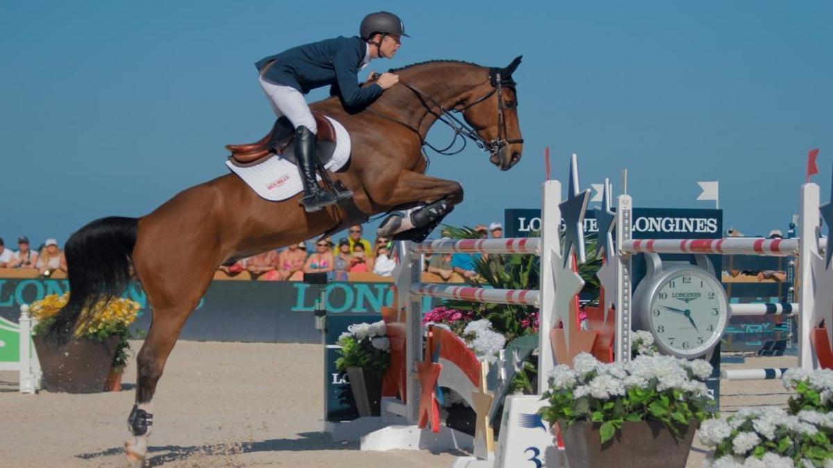 Scott Brash of Great Britain and his horse Hello Sanctos jump over an obstacle in the first round of the Longines Global Champions Tour in Miami Beach in April 2015.