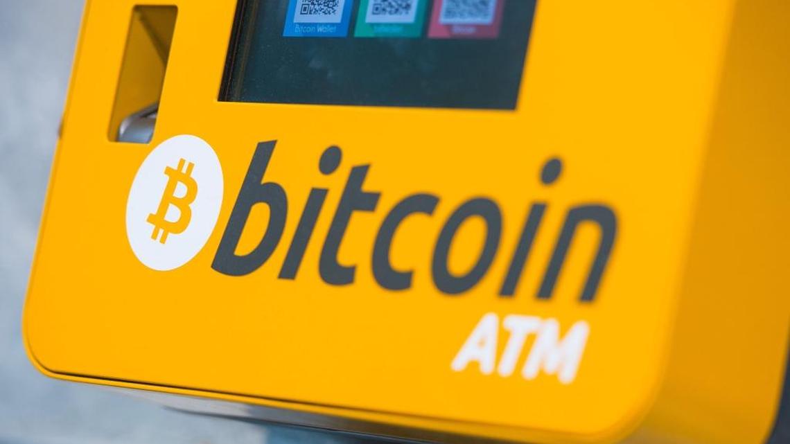 This is a Oct. 16, 2015, file photo of a Bitcoin ATM. An Australian man long thought to be associated with the digital currency Bitcoin has publicly identified himself as its creator. BBC News said Monday, May 2, 2016, that Craig Wright told the media outlet he is the man previously known by the pseudonym Satoshi Nakamoto. The computer scientist, inventor and academic says he launched the currency in 2009 with the help of others.