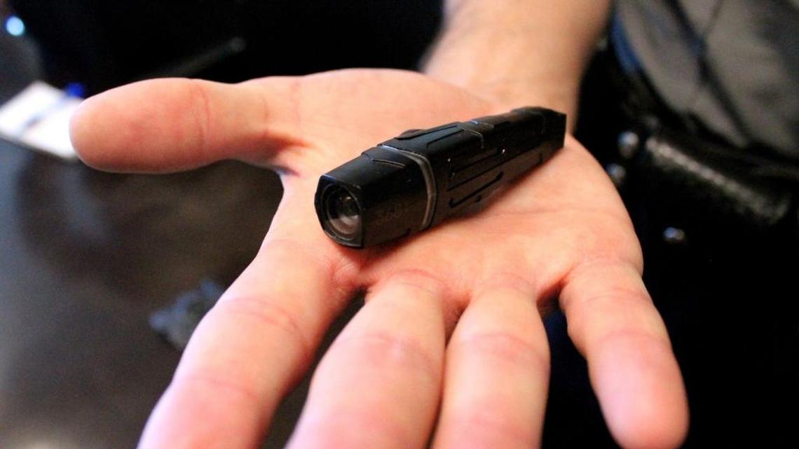 Officer Michael Catalano of the Daytona Beach Police Department displays a camera recently brought into use by the department.