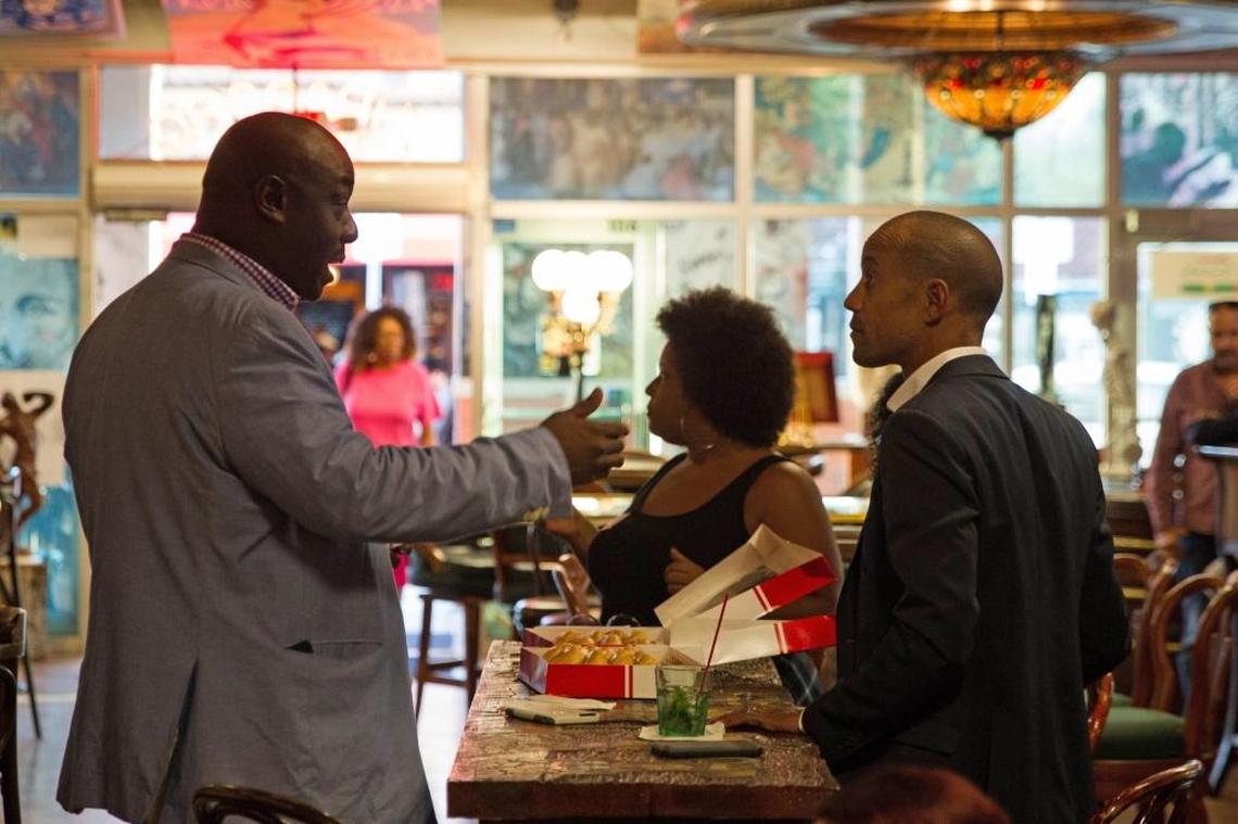 Yoel Molina and Juan Bruno chat during a gathering of Afro-Latino Professionals.