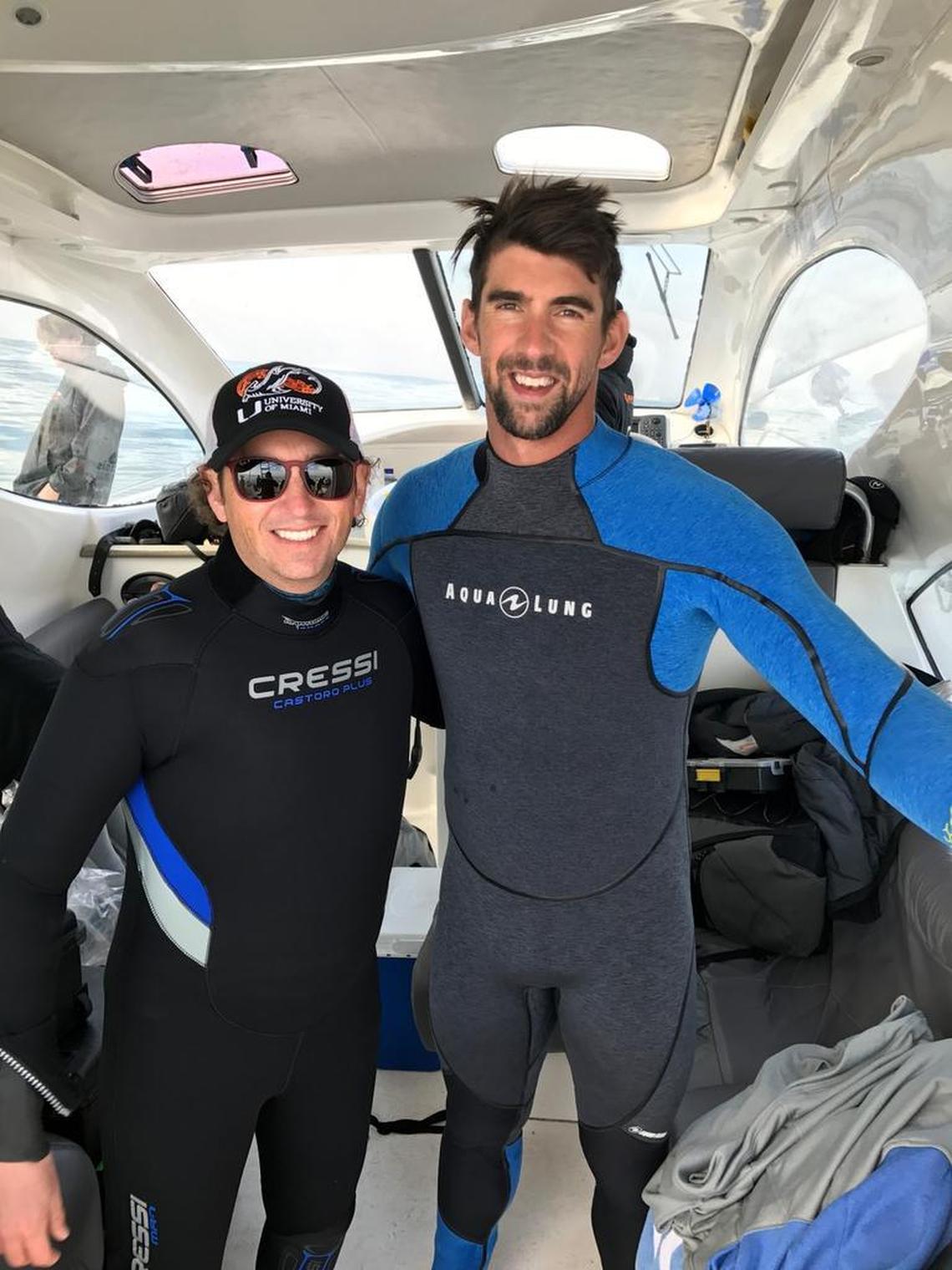 University of Miami shark expert Neil Hammerschlag and Olympic swimming medalist Michael Phelps.