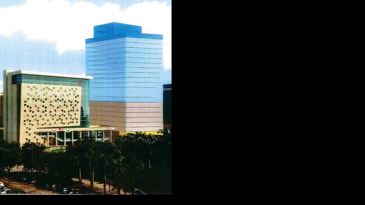 
A rendering by the HOK architectural firm of what a new civil courthouse could look like rising next to the existing Miami-Dade Children’s Courthouse. 
