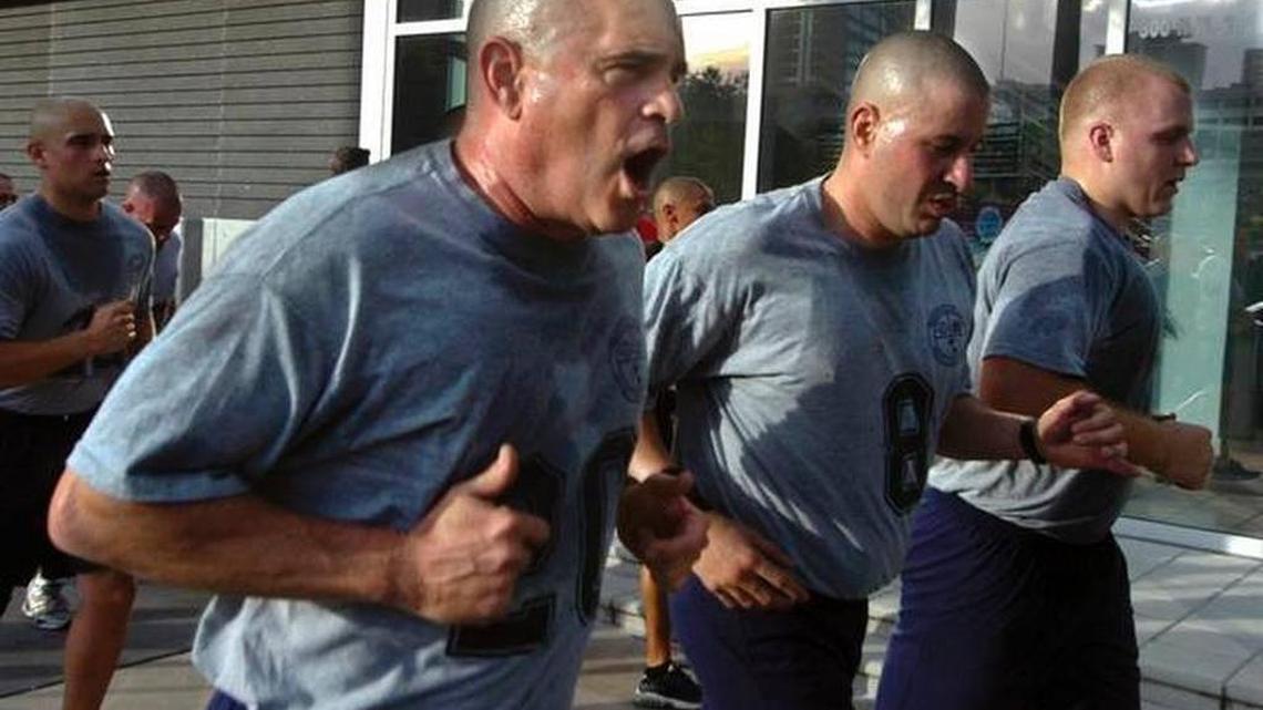 Miami Beach City Commissioner Ed Tobin (No. 20), runs a 2.5-mile course with other Miami police cadets half his age in 2011. Tobin, a 53-year-old lawyer, will be sworn in as a Miami officer Friday.