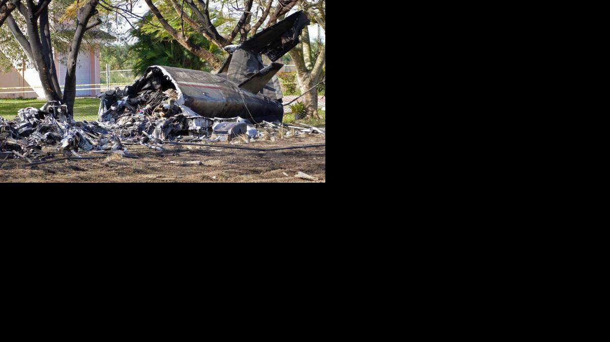 
Remnants of Wednesday’s plane crash in Southwest Miami-Dade County were still visible Thursday morning, Feb. 12, 2015.

