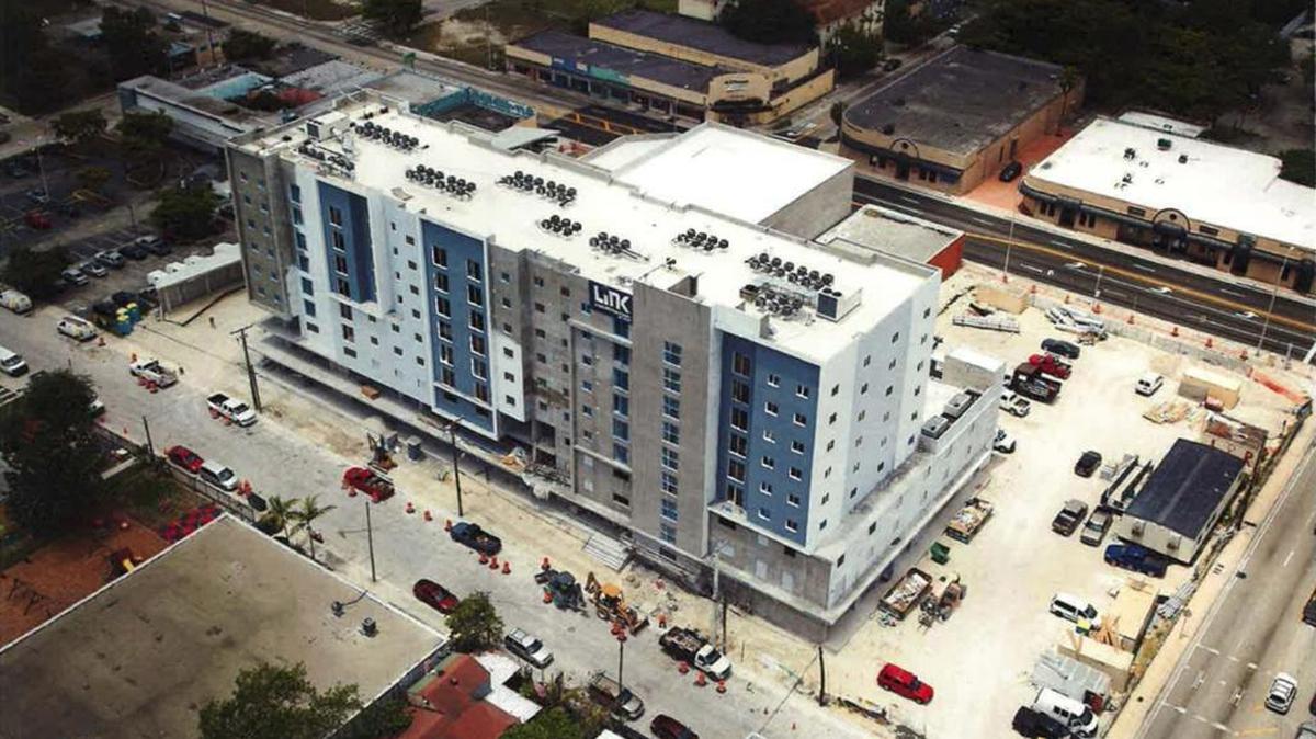 An image included in Atlantic Pacific Communities’ Liberty Square redevelopment application of the Seventh Avenue Transit Village, looking west over Northwest Sixth Court. The developer is seeking funds to build Phase II of the project on the vacant, L-shaped piece of land along 62nd Street.