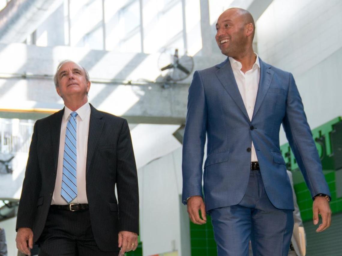 Miami-Dade Mayor Carlos Gimenez, left, and Miami Marlins CEO Derek Jeter tour Marlins Park on Jan. 16, 2018. Gimenez said during the meeting the Marlins requested help in removing the ballpark’s home-run sculpture, which cost about $2.5 million to create. Artist Red Grooms said he does not want to see the sculpture moved.