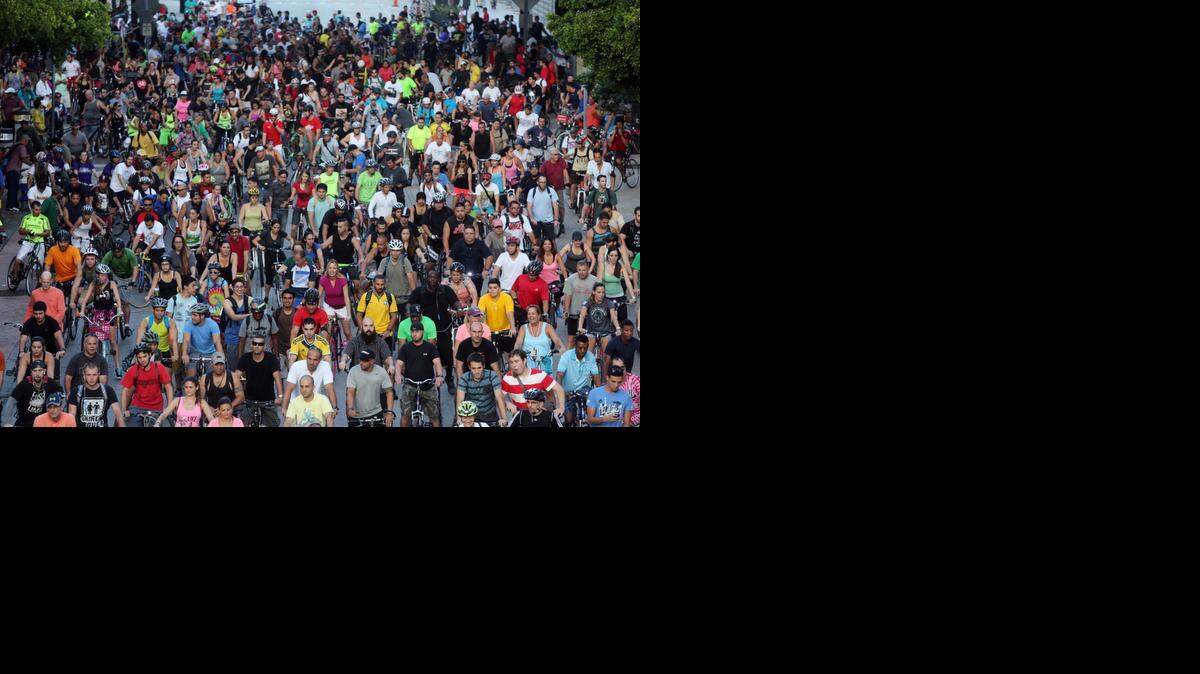 
Cyclists participate in the monthly Critical Mass ride on June 27, 2014, in downtown Miami. The U.S. Census Bureau announced Tuesday that Florida approached 20 million residents in 2014 and surpassed the Empire State as the nation’s third most populous state.
